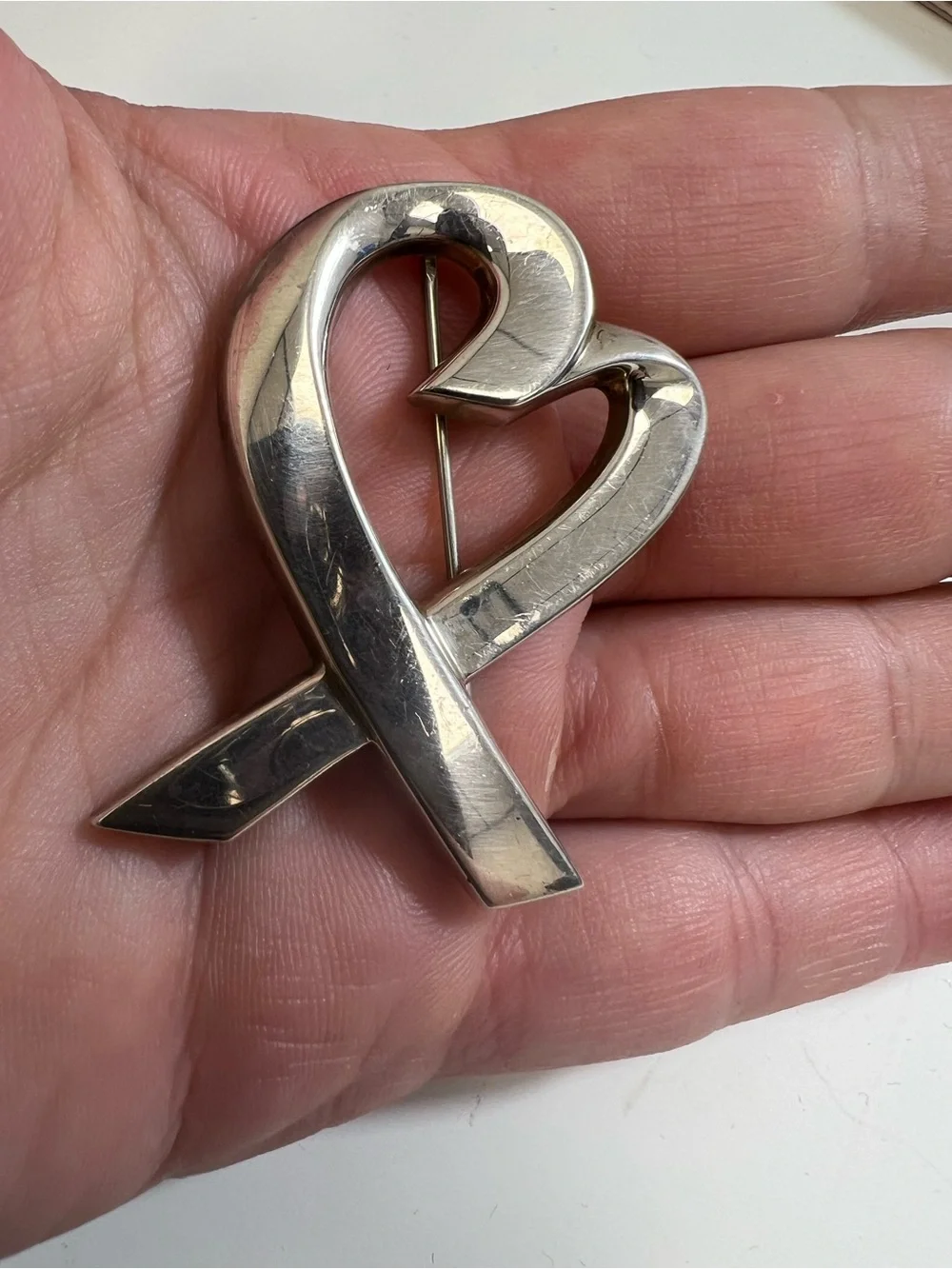 Tiffany & Co. Paloma Picasso Loving Heart Brooch in polished sterling silver